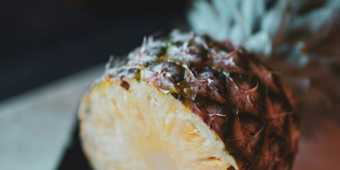 a close up of a piece of fruit on a plate